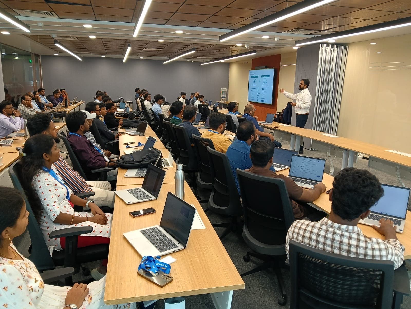 A Synottic facilitator walking a large cohort through building their first AI agent