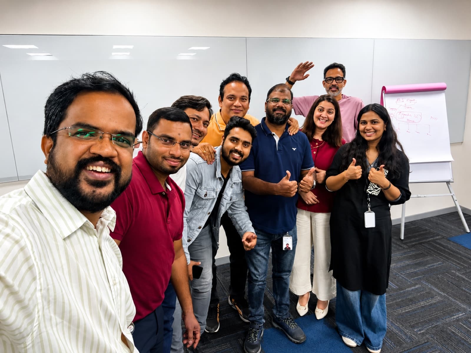 HR leaders celebrating after building their AI agents live in the workshop